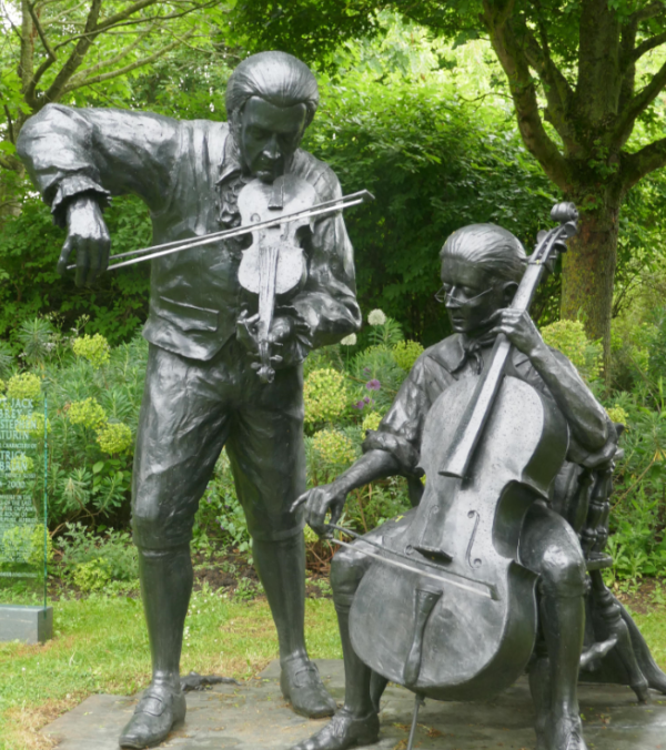 bronze violins playing sculpture