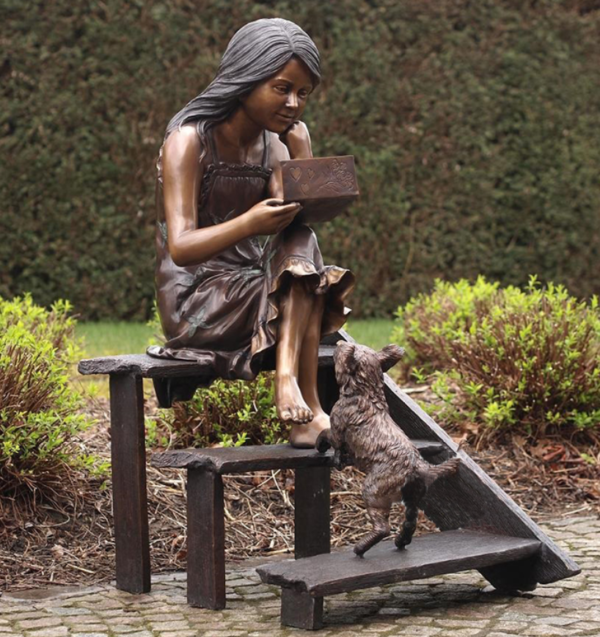 girl dog bench sculpture