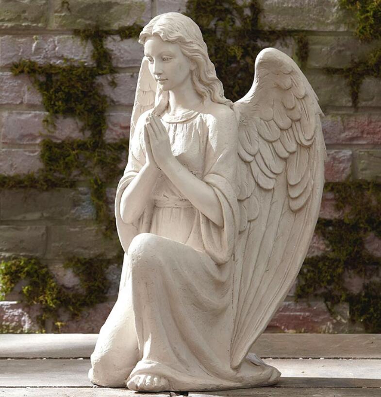 kneeling angel statue