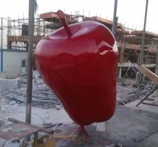 red apple paint sculpture