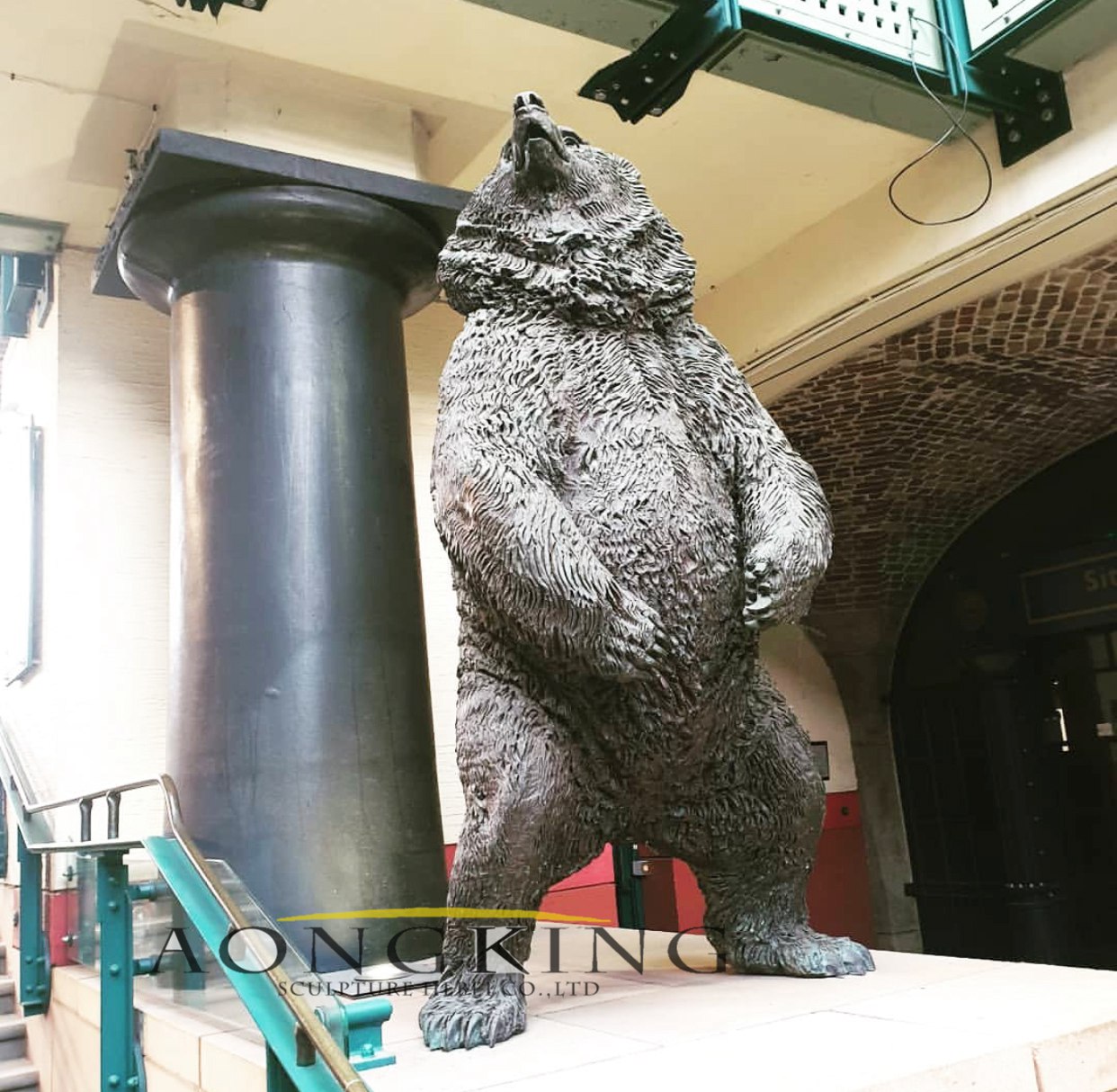 Large cast bronze bear sculpture