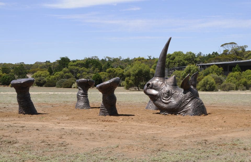 Lying rhinoceros statue 