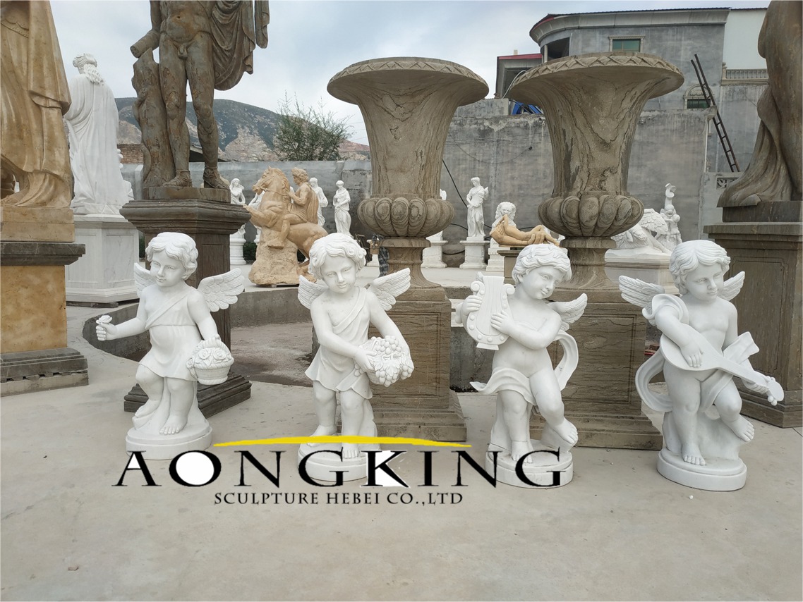 Four music cherub statue