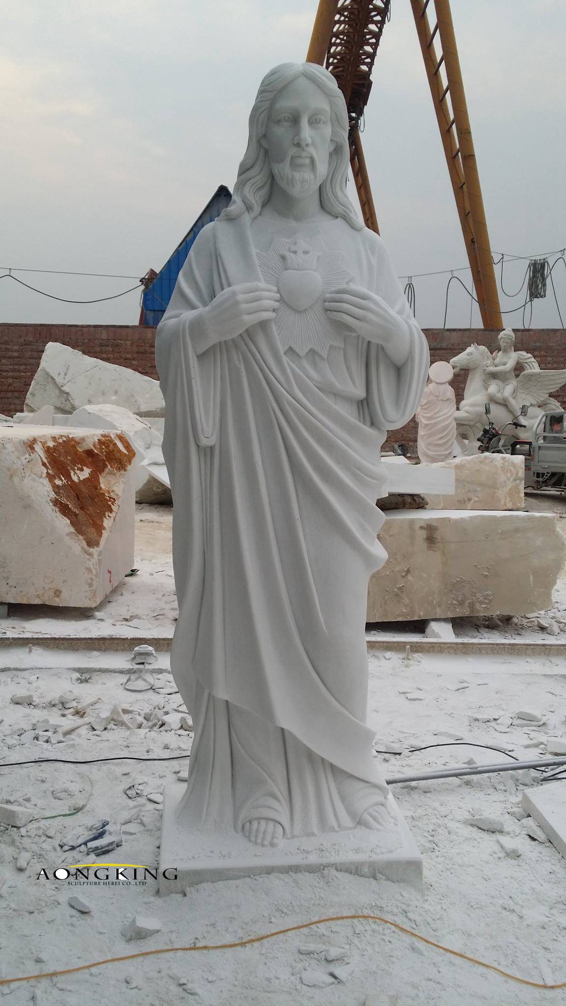 Stone carving jesus statue