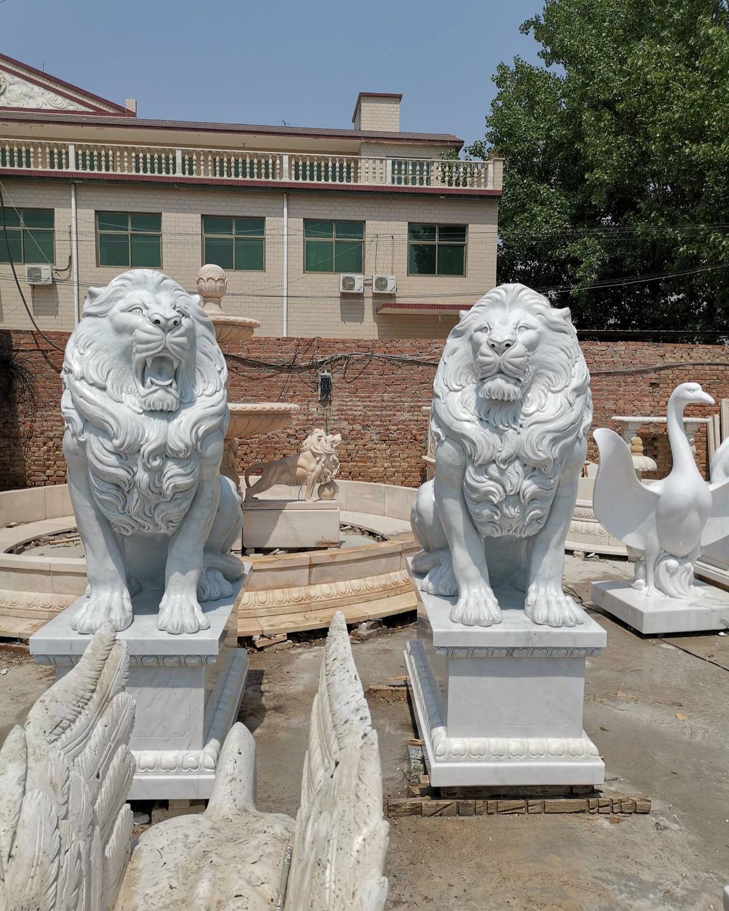 Stone lions statues