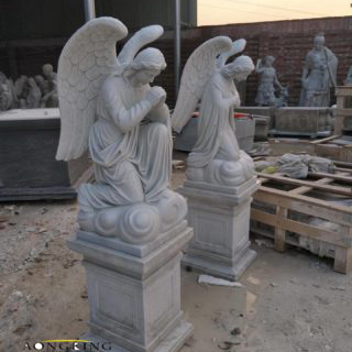 Outdoor marble angel sculpture