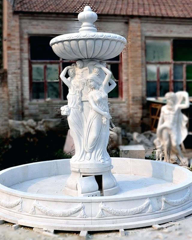 women statues water-fountain statues