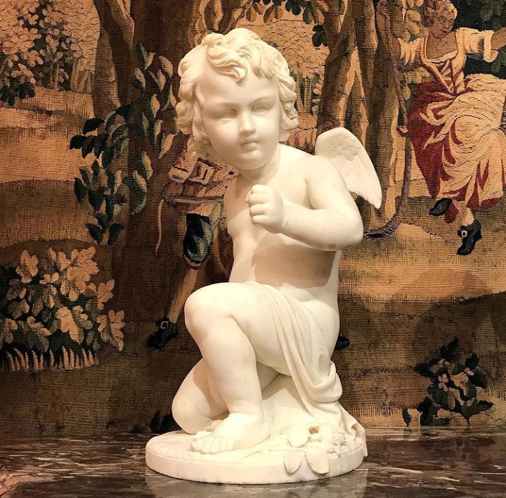 marble kneeling cherub