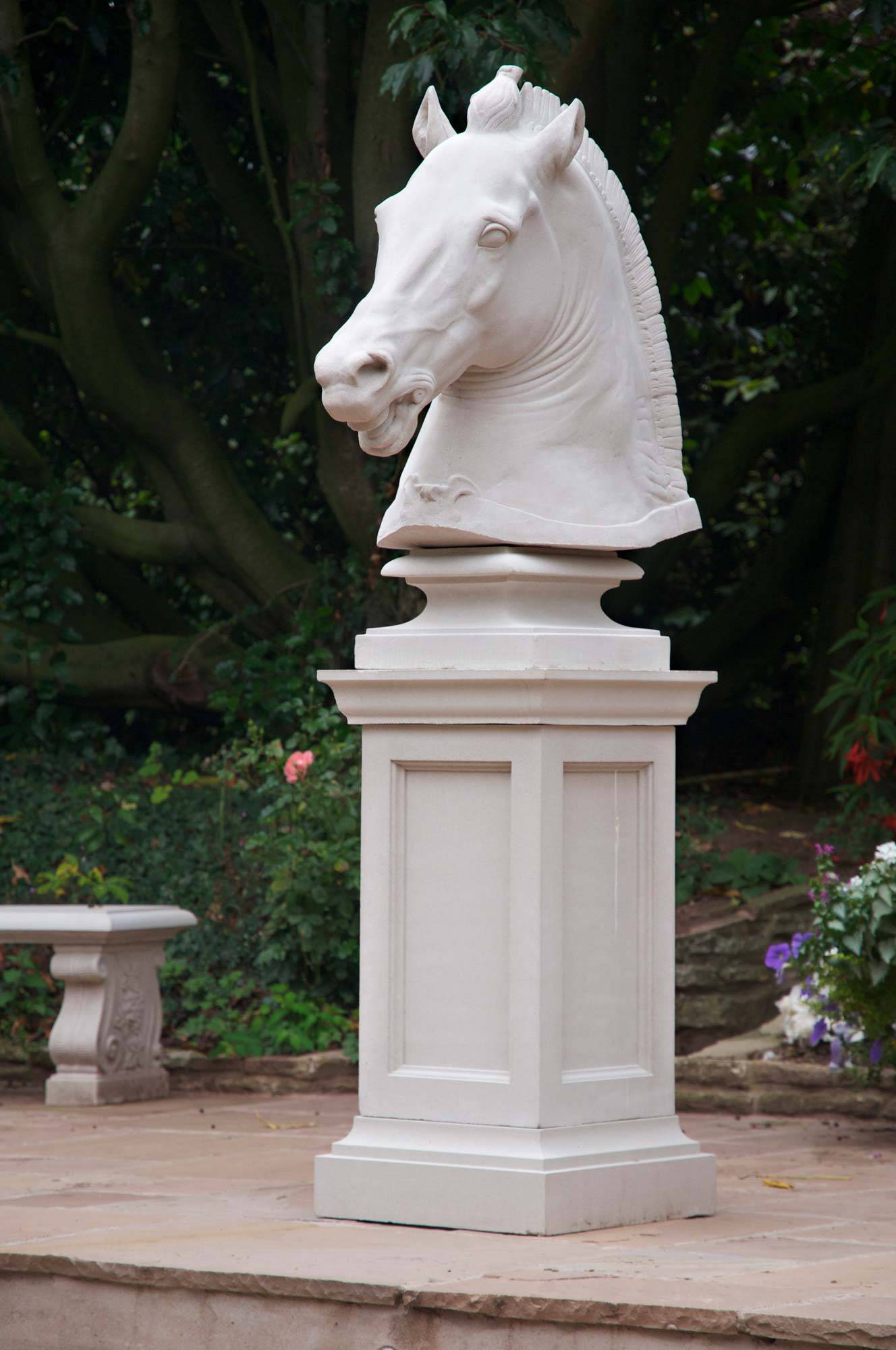 marble horse head statue with the base
