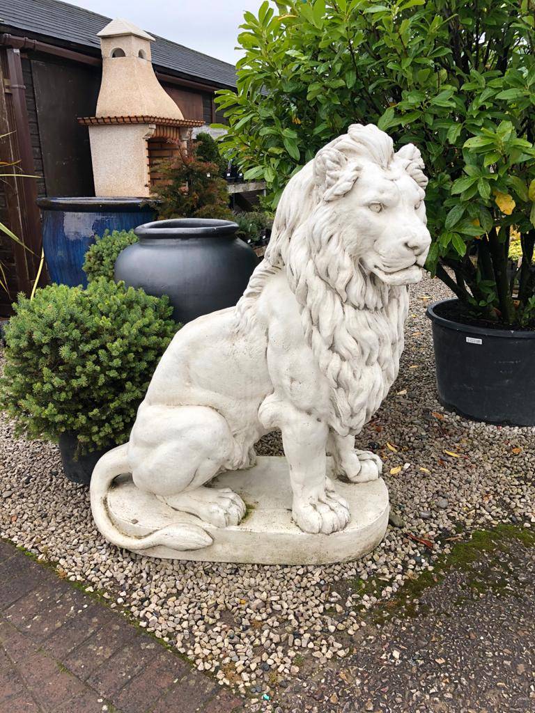 lion statues outside house (4)