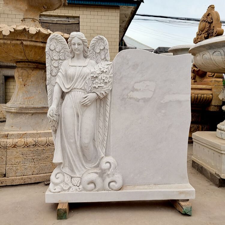 marble angel on tombstone