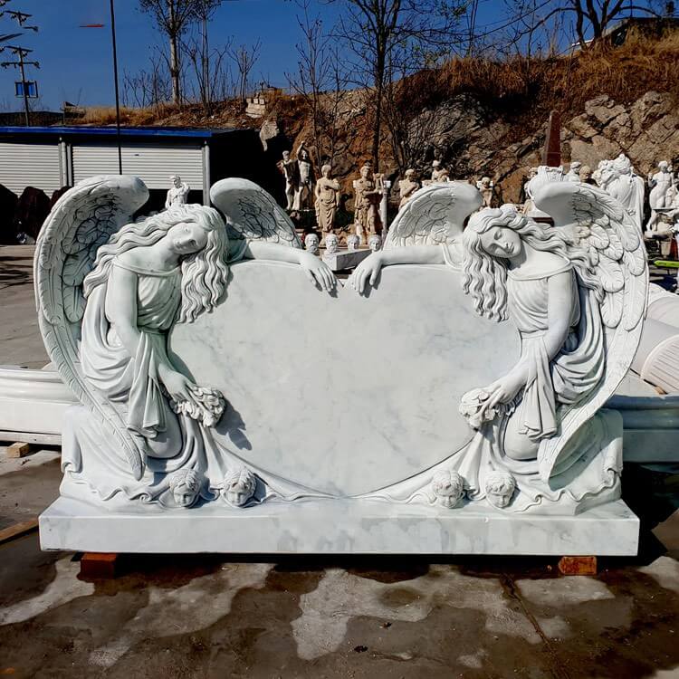 headstones with angels marble statue