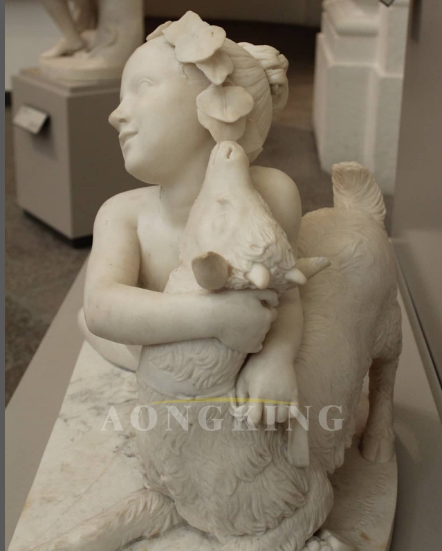Young girl playing with a kid marble statue (2)